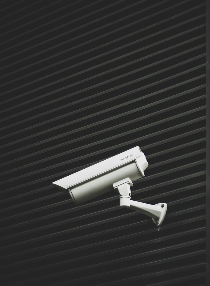 A wall-mounted CCTV camera